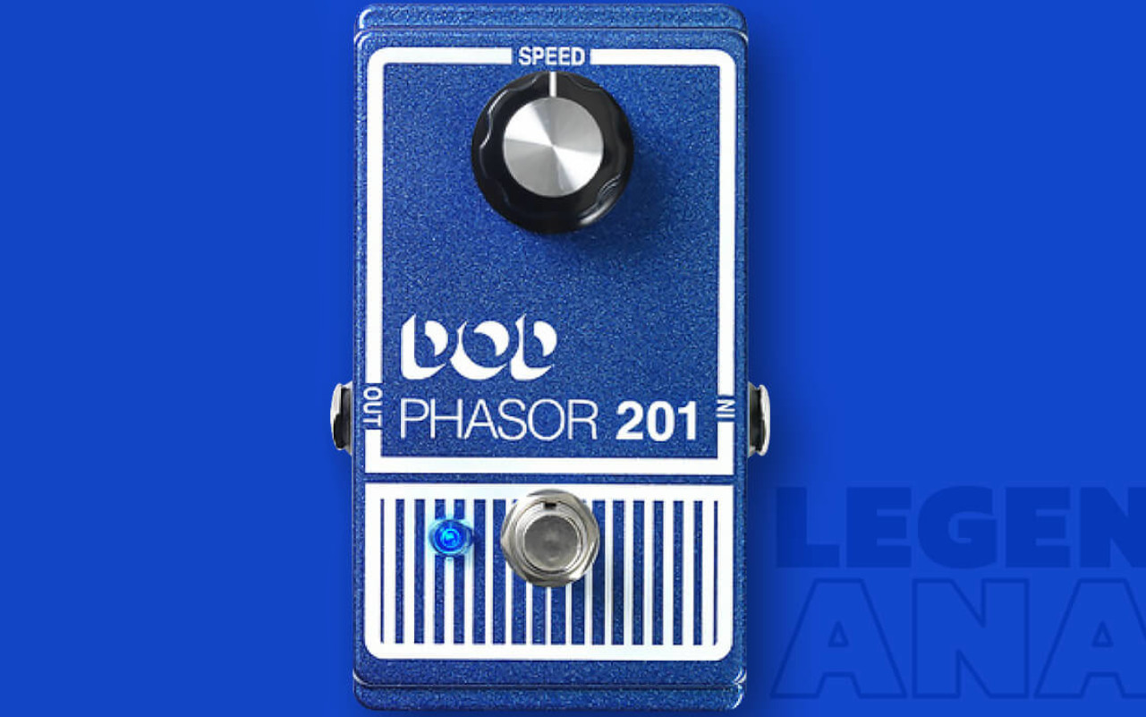 A imagem mostra um DOD PHASOR 201 em um fundo azul