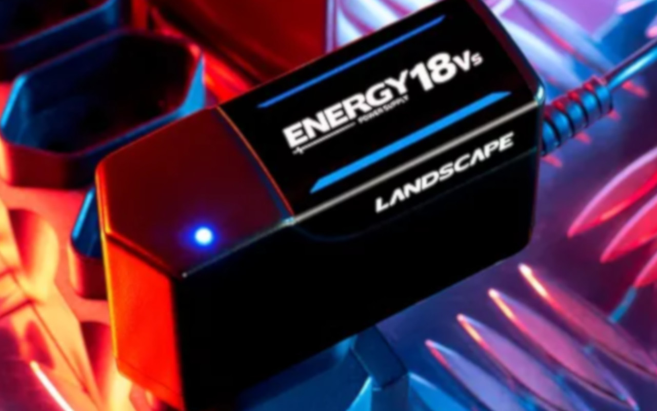 A imagem mostra uma fonte landscape energy 18 V sobre um fundo metálico