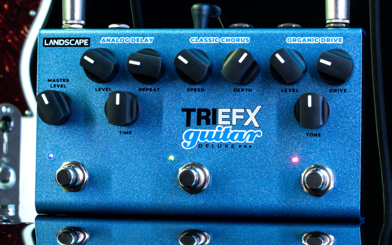 A imagem mostra um LANDSCAPE TRIGTX TRIEFX GUITAR DELUXE em um fundo preto